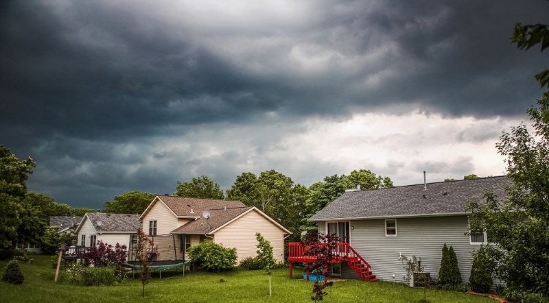 houses with storm cloud