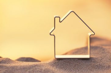 House on beach during sunset. Concept and idea