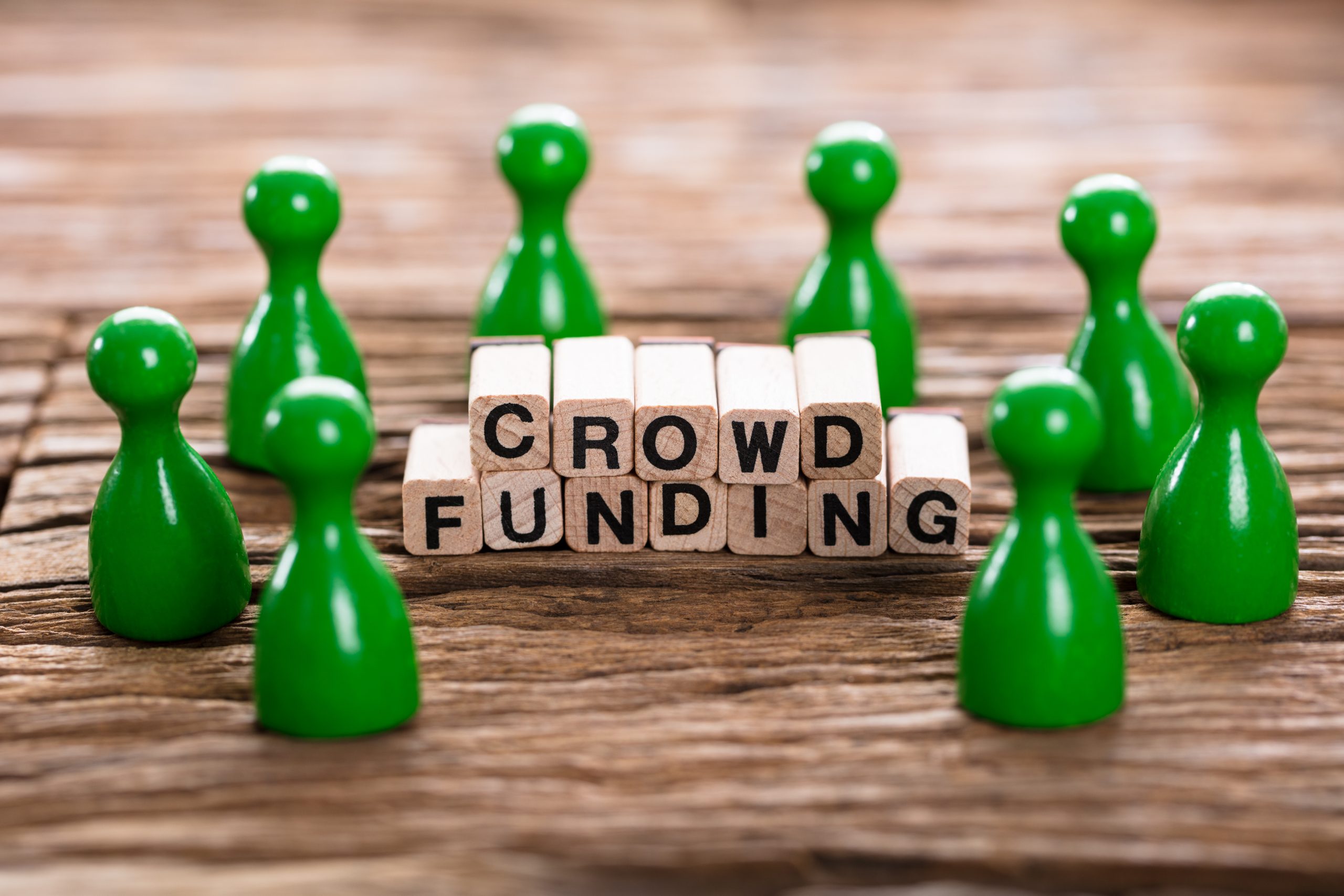 Crowd Funding Word Made With Wooden Blocks