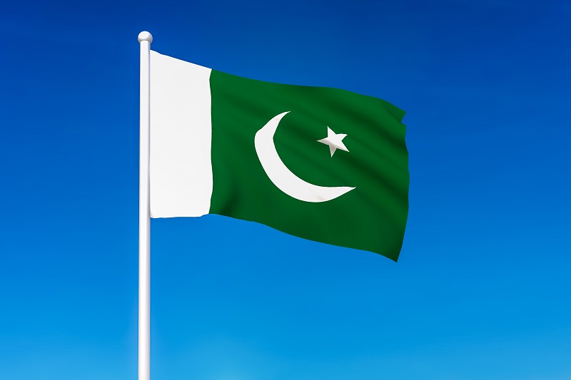 Waving flag of Pakistan on the blue sky background