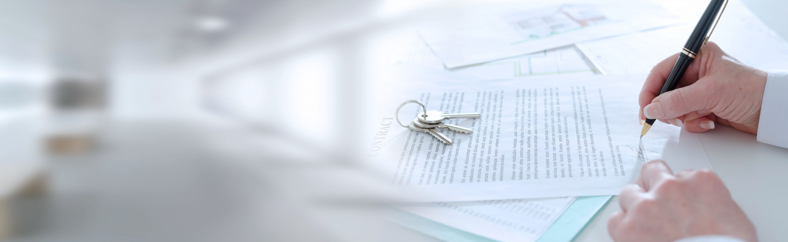 Client signing a real estate contract; panoramic banner
