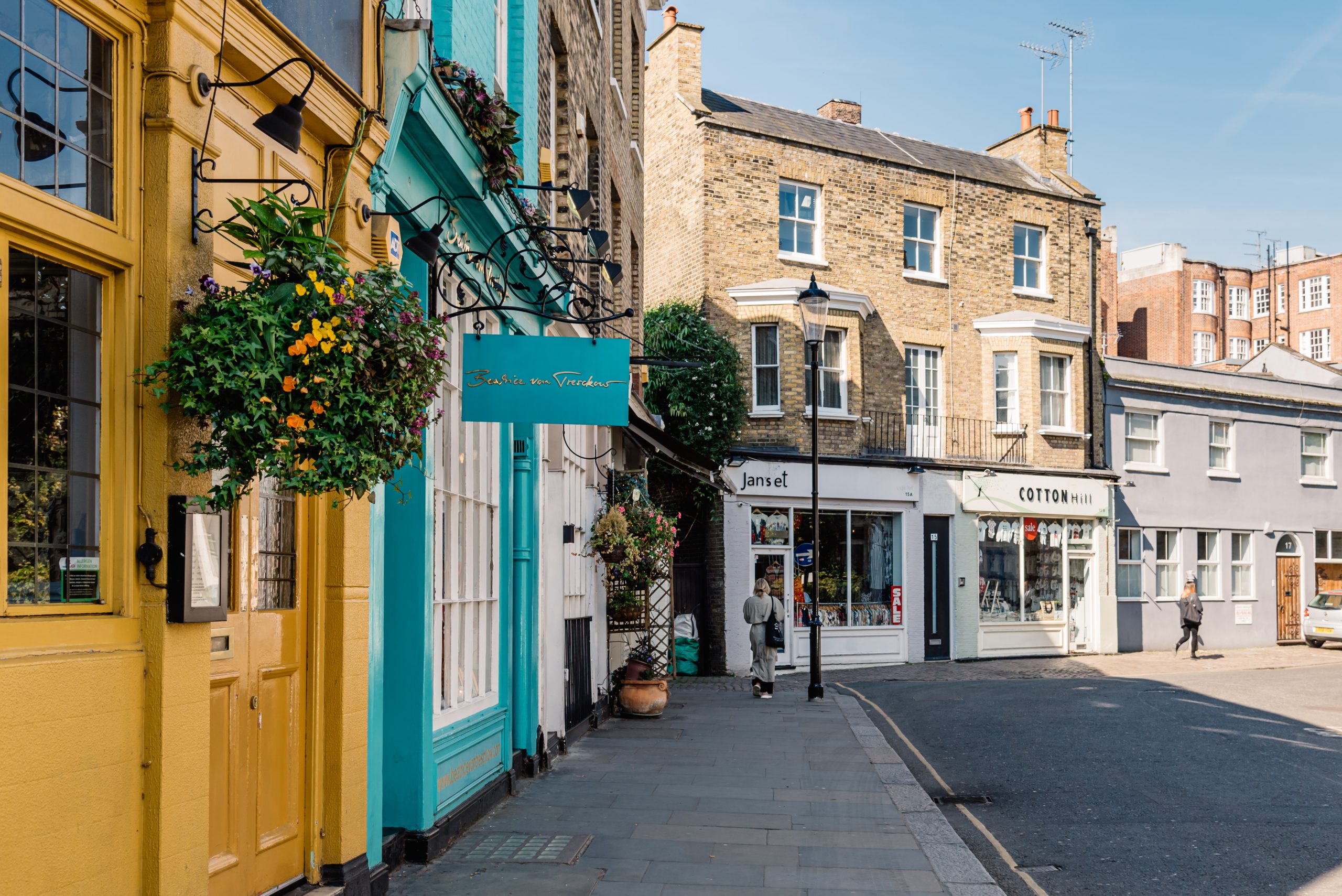 Picturesque street with small business and stores at Notting Hill in London, UK