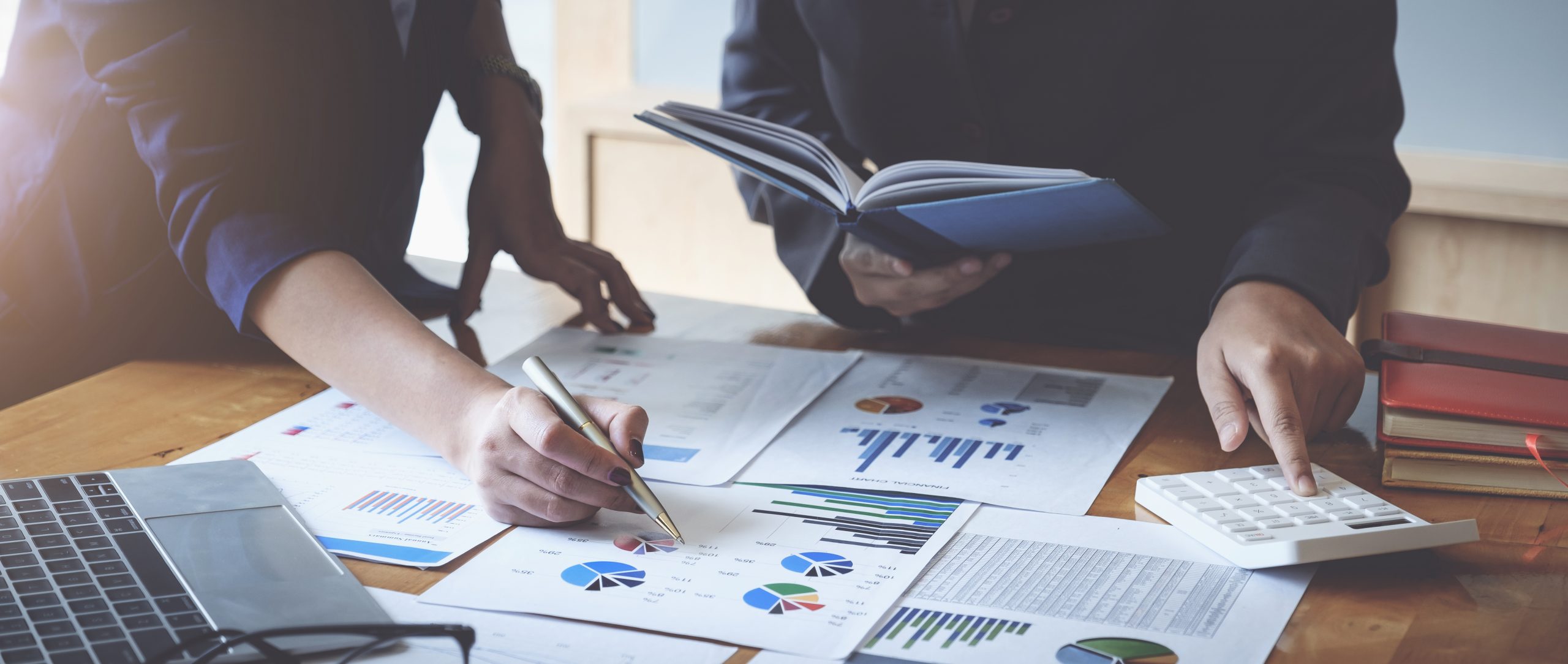 Group of Businesswoman and Accountant checking data document on digital tablet for investigation of corruption account . Anti Bribery concept.