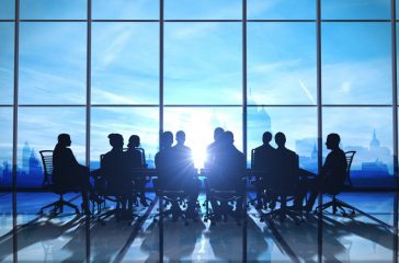 Management Team in office silhouette