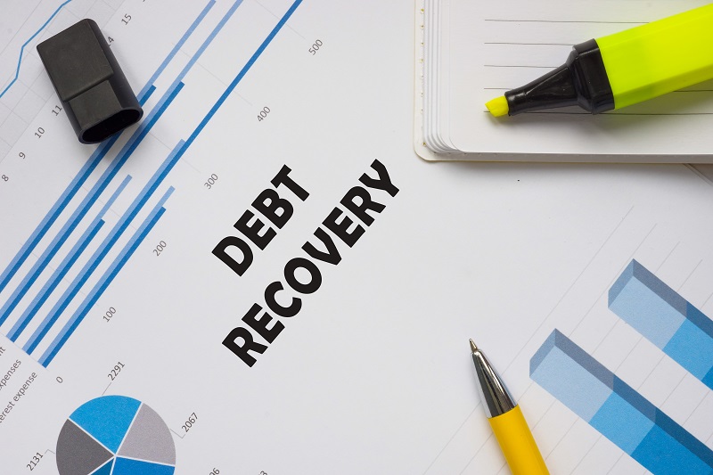 Business concept meaning DEBT RECOVERY with phrase on the page.