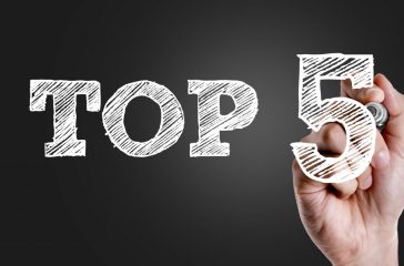 Hand writing the text: Top 5