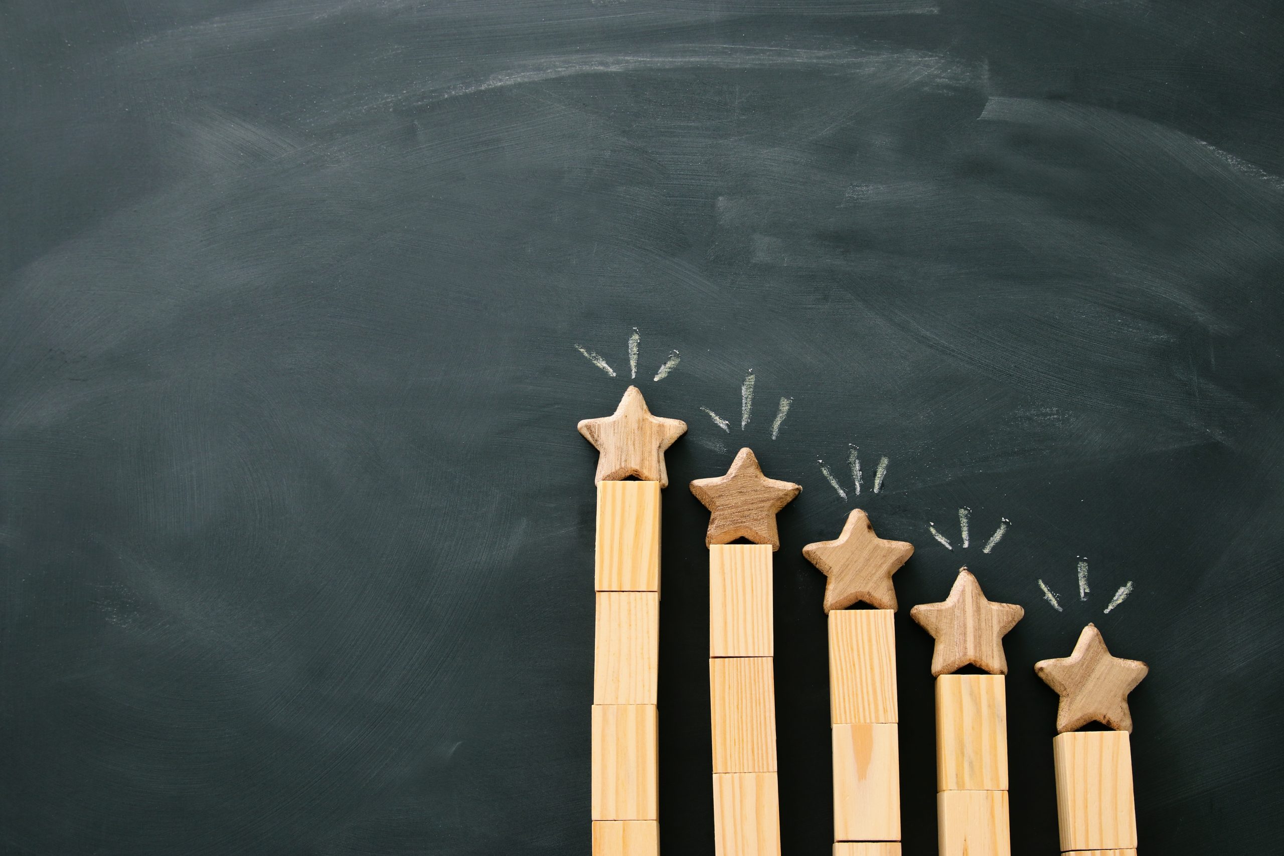 concept image of setting a five star goal. increase rating or ranking, evaluation and classification idea. Top view. Flat lay.