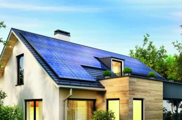 Solar panels on the gable roof of a modern house