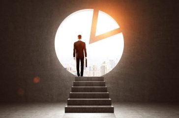 Man exiting through a pie diagram in a wall