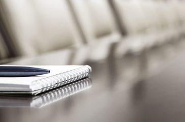 notepad on a table in meeting room