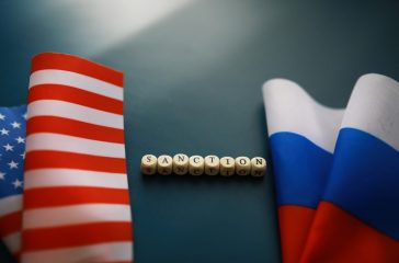 Background political. In the background are the American and Rus