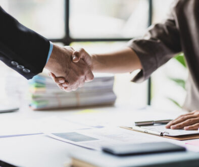 Handshake, Business cooperation at a meeting of business people. Business partners shaking hands in a meeting.